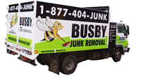 Busby Truck Hauling Appliances to be Recycled